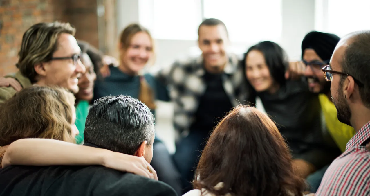 Group of people laughing and enjoying time together